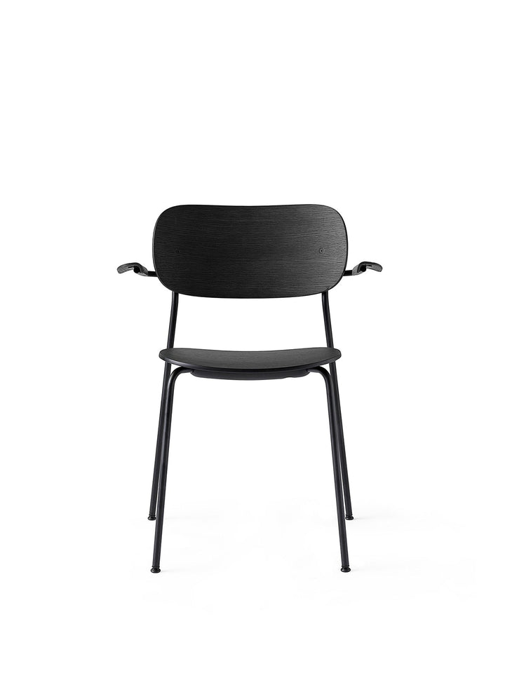 Co Dining Chair, with armrest, Black, Veneer by Audo Copenhagen - Together, mutually, in common: the words that define the prefix ‘co-’ are at the heart of our new Co Dining Chair design. Conceived in collaboration with The Office Group and Norm Architect
