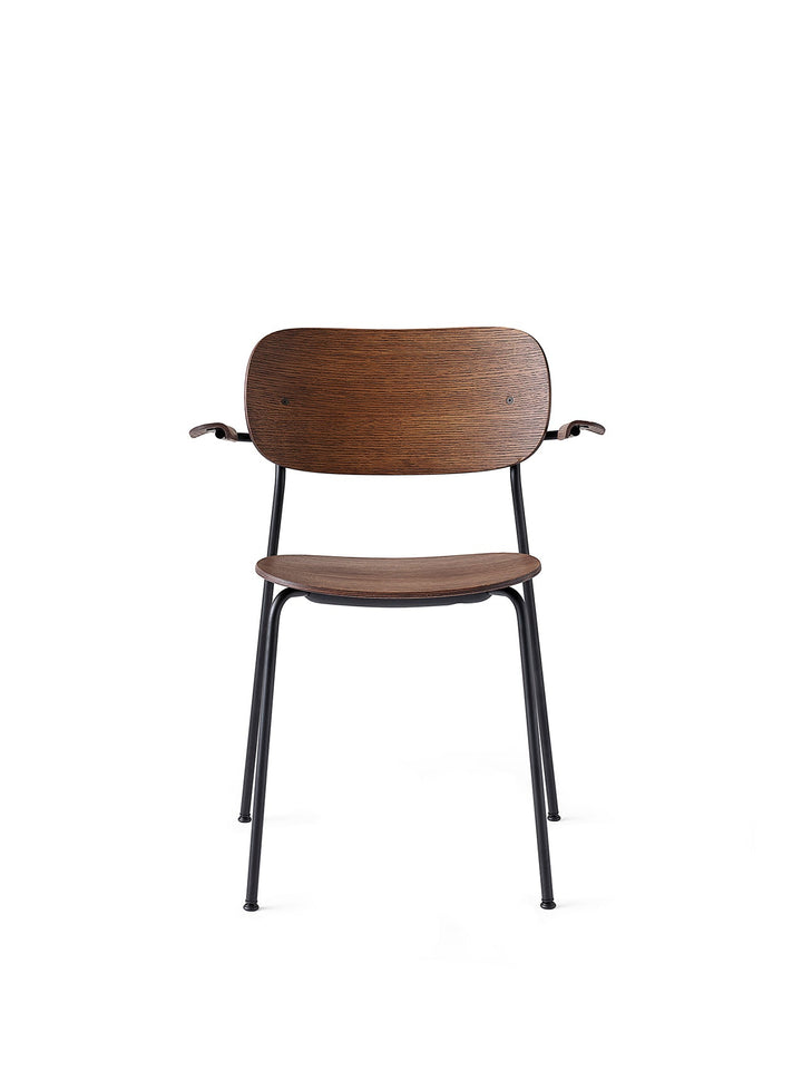Co Dining Chair, with armrest, Black, Veneer by Audo Copenhagen - Together, mutually, in common: the words that define the prefix ‘co-’ are at the heart of our new Co Dining Chair design. Conceived in collaboration with The Office Group and Norm Architect