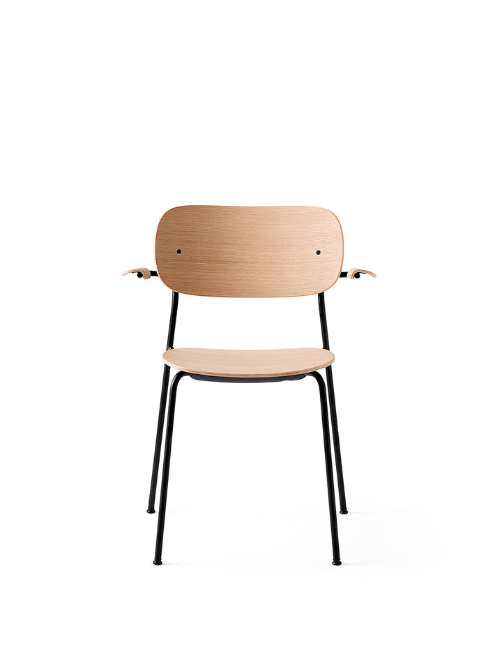 Co Dining Chair, with armrest, Black, Veneer by Audo Copenhagen - Together, mutually, in common: the words that define the prefix ‘co-’ are at the heart of our new Co Dining Chair design. Conceived in collaboration with The Office Group and Norm Architect