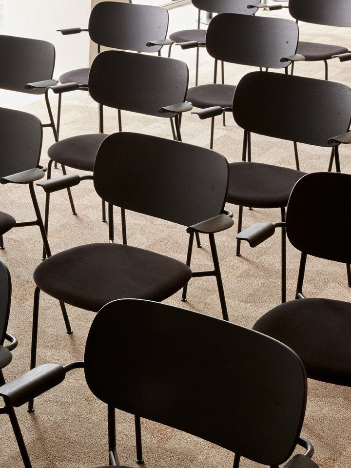 Co Dining Chair, with armrest, Black, Veneer by Audo Copenhagen - Together, mutually, in common: the words that define the prefix ‘co-’ are at the heart of our new Co Dining Chair design. Conceived in collaboration with The Office Group and Norm Architect