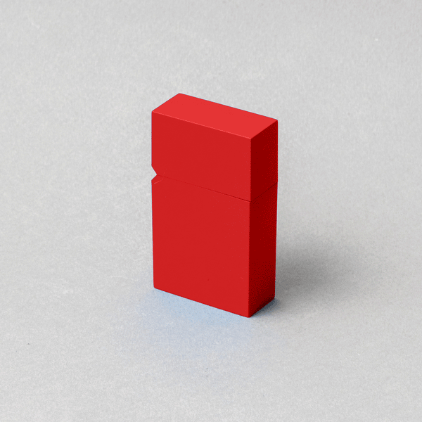 TSUBOTA PEARL red refillable petrol lighter, handcrafted in Tokyo, showcasing exceptional metalwork and luxury design.