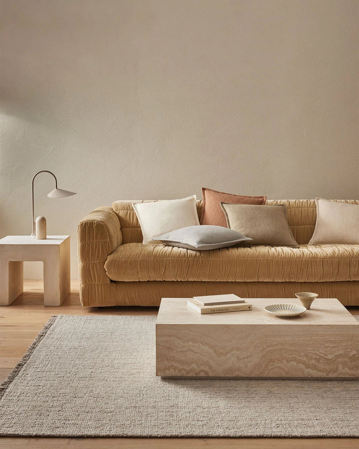 Figlio Fossil Expertly crafted to resemble a chunky woven linen, the Figlio cushion exudes a natural charm that seamlessly blends with any décor style.The Fossil colourway of Figlio is a light taupe that adds a touch of refinement while maintaining a cosy