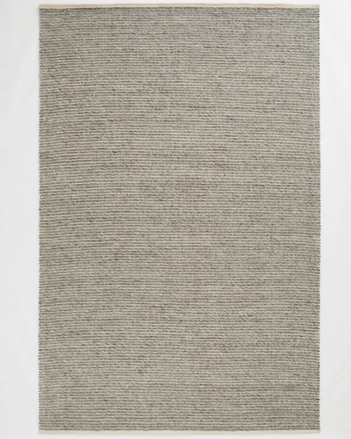 Andes Feather One of our most popular rugs, Andes is a hand-woven textured floor rug featuring a ribbed design — the range bringing a coastal vibe with beautiful visual interest. Made from 50% Wool and 50% Cotton, Andes uses chunky spun wool yarn and warp