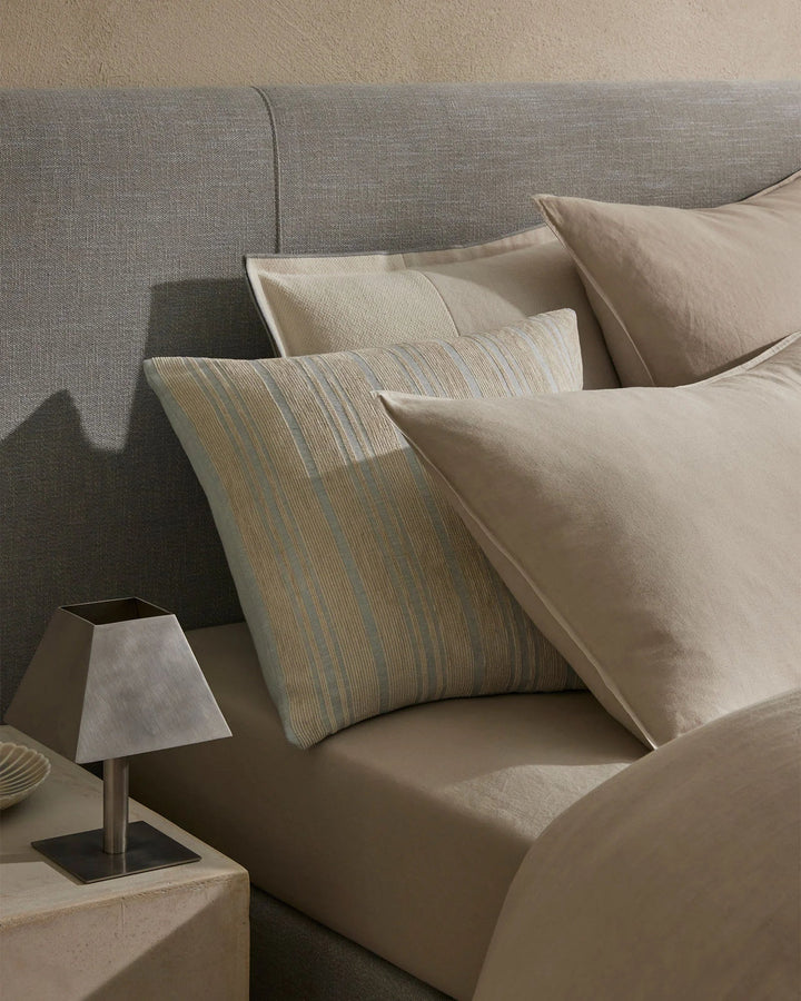 Adriana Glacier A woven mix of lustrous chenille and dry natural fibres gives Adriana a chic finish and luxe feel. A palette that heros modern, essential, on-trend hues. Glacier combines sky blue with a contrasting sandstone stripe.Timeless and classic in