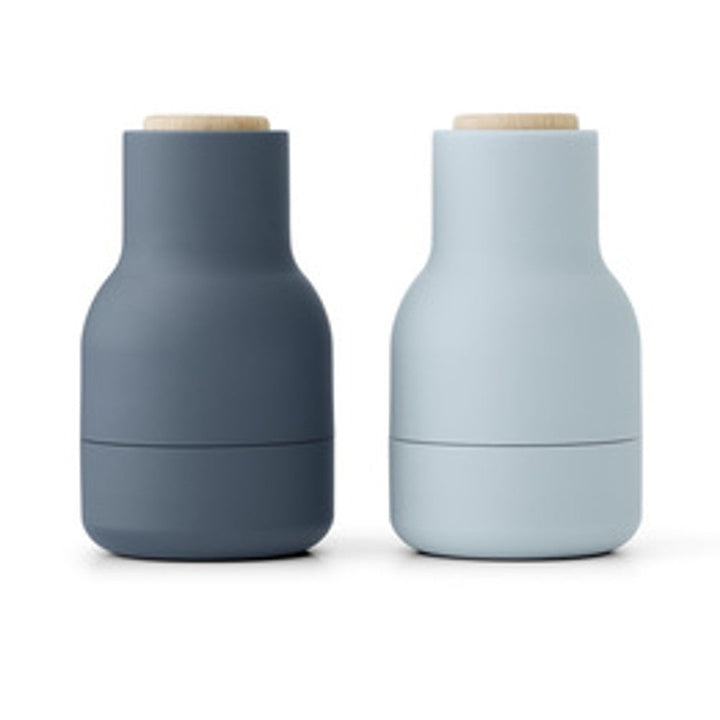 Audo CPH Bottle Grinder, Small by Audo Copenhagen - The Small Bottle Grinders come as a two-piece set of salt and pepper mills, each equipped with a robust ceramic mechanism that efficiently grinds various spices. Designed in a bottle shape that fits comf