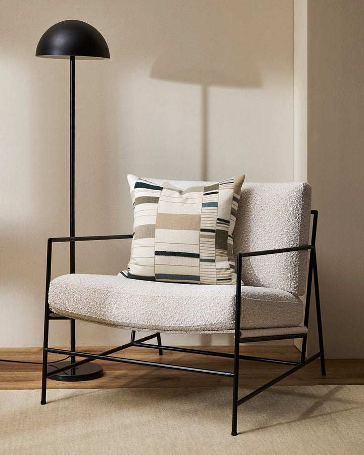 Ana Cushion Featuring a serene composition inspired by Korean Bogaji cloth, our Ana cushion adds a sense of tranquil sophistication to your space. The delicate linear design is complemented by small sections of tufted embroidery, adding a subtle surface t