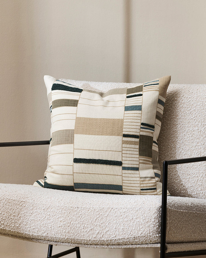 Ana Cushion Featuring a serene composition inspired by Korean Bogaji cloth, our Ana cushion adds a sense of tranquil sophistication to your space. The delicate linear design is complemented by small sections of tufted embroidery, adding a subtle surface t