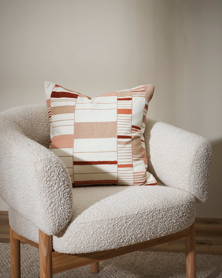 Ana Cushion Featuring a serene composition inspired by Korean Bogaji cloth, our Ana cushion adds a sense of tranquil sophistication to your space. The delicate linear design is complemented by small sections of tufted embroidery, adding a subtle surface t