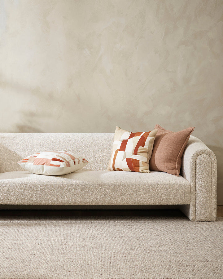 Ana Cushion Featuring a serene composition inspired by Korean Bogaji cloth, our Ana cushion adds a sense of tranquil sophistication to your space. The delicate linear design is complemented by small sections of tufted embroidery, adding a subtle surface t