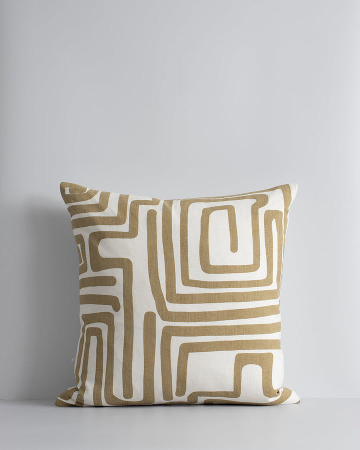 Anise Cushion Primal and abstract, the Anise makes a subtle, on-trend statement with organic hand-painted patterns. Warm tones of brass and ivory bring a sense of calm and serenity to spaces. Pair with sister cushion Chemin and core cushions Cassia Tobacc