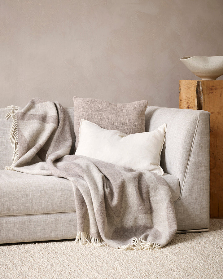 Arcadia Cushion Raw texture is celebrated in stunning natural tones. Handwoven in 100% linen, the Arcadia features a 1cm flange edge, enhancing strength and durability while creating an easy and contemporary aesthetic. The natural charcoal tone and lumbar