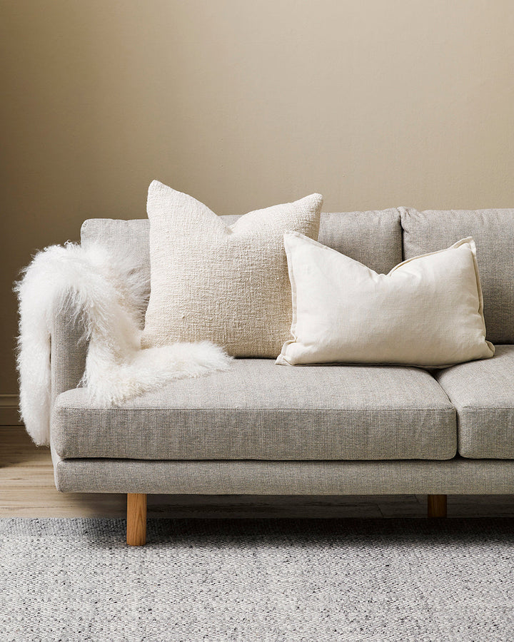 Arcadia Cushion Raw texture is celebrated in stunning natural tones. Handwoven in 100% linen, the Arcadia features a 1cm flange edge, enhancing strength and durability while creating an easy and contemporary aesthetic. The natural charcoal tone and lumbar