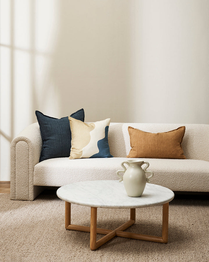 Arcadia Cushion Raw texture is celebrated in stunning natural tones. Handwoven in 100% linen, the Arcadia features a 1cm flange edge, enhancing strength and durability while creating an easy and contemporary aesthetic. The natural charcoal tone and lumbar