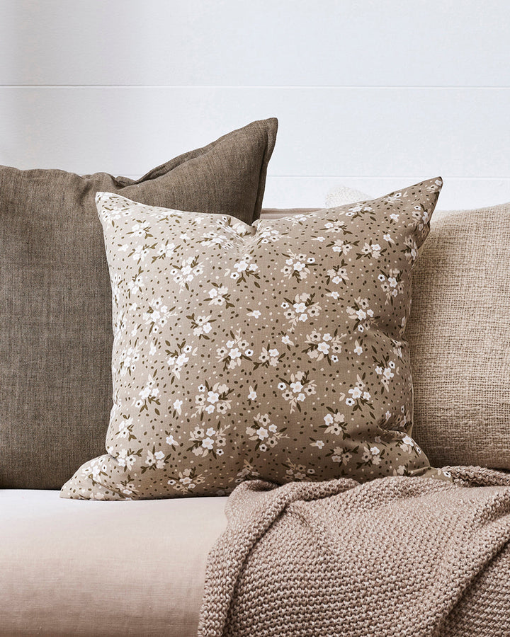 Aria Cushion Vintage cottage charm is reinterpreted for modern living with our Aria cushion. Delicate florals in soft hues of cocoa, almond on a sage come together in an inviting and comforting aesthetic. Pair with our Mia Cushion to create contemporary,