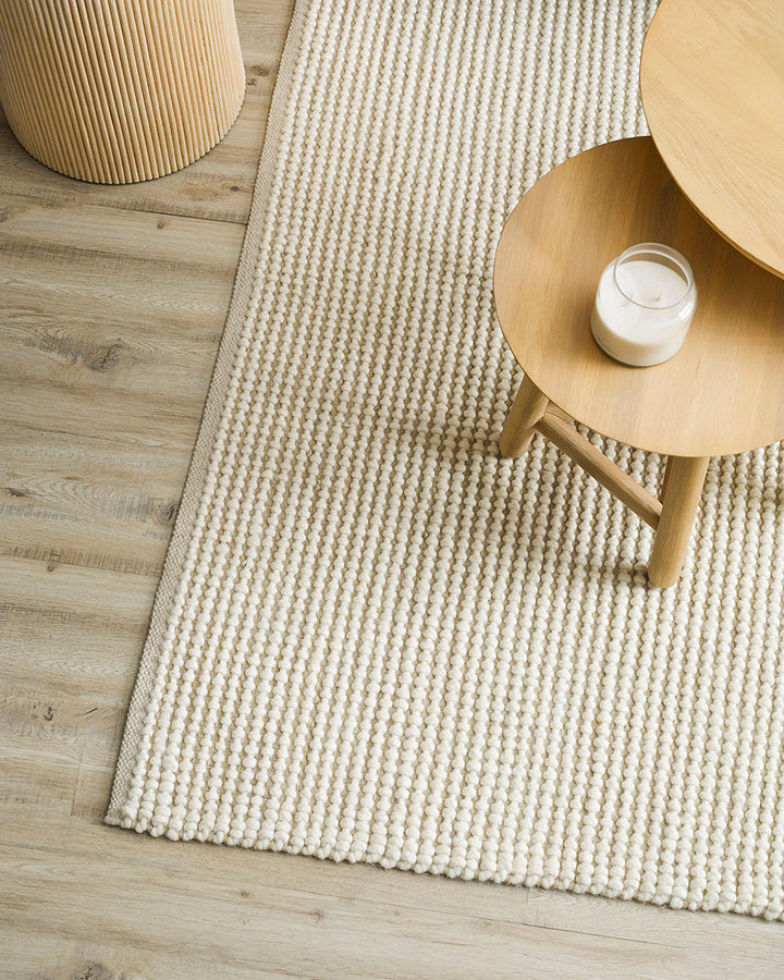 Arizona Floor Rug Add understated style to your interior with the Arizona floor rug. Featuring a heavily textured knot-style weave, this rug looks impressive and feels equally as divine underfoot. The dark taupe base is contrasted by a light fawn loop des