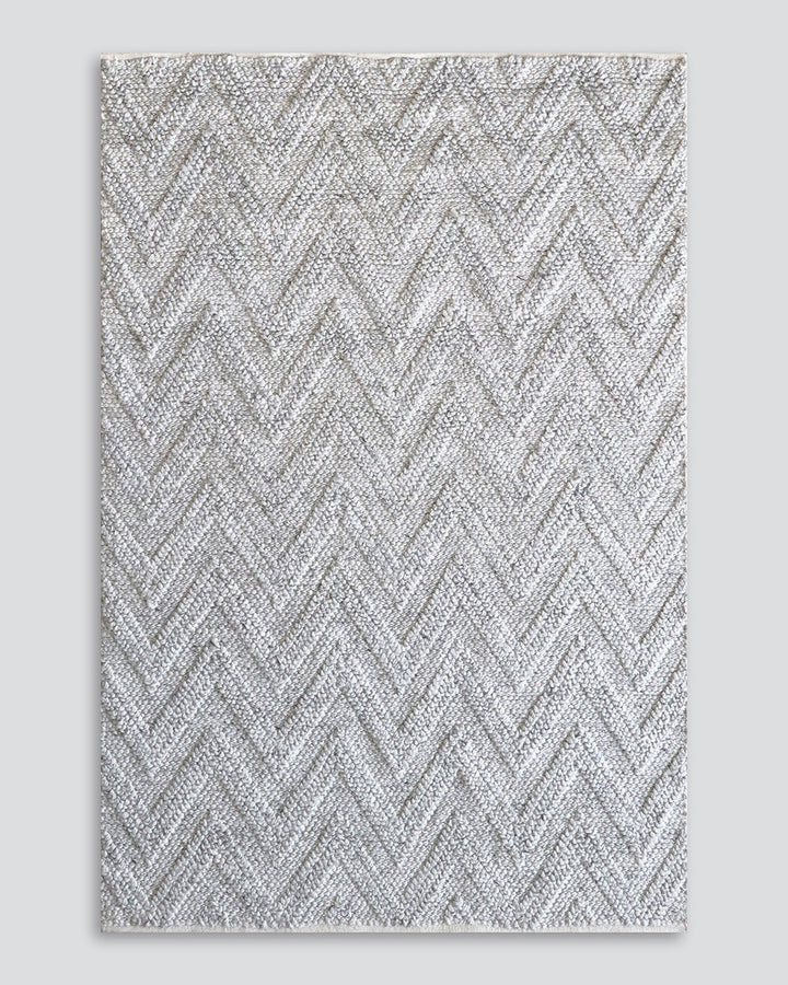 Arrowtown Floor Rug Create a peaceful interior with the soft wool blend of the Arrowtown. A simplistic raised chevron weave instils character and adds a beautiful, textural feel underfoot. Australian Stock Buy at beon.com.au