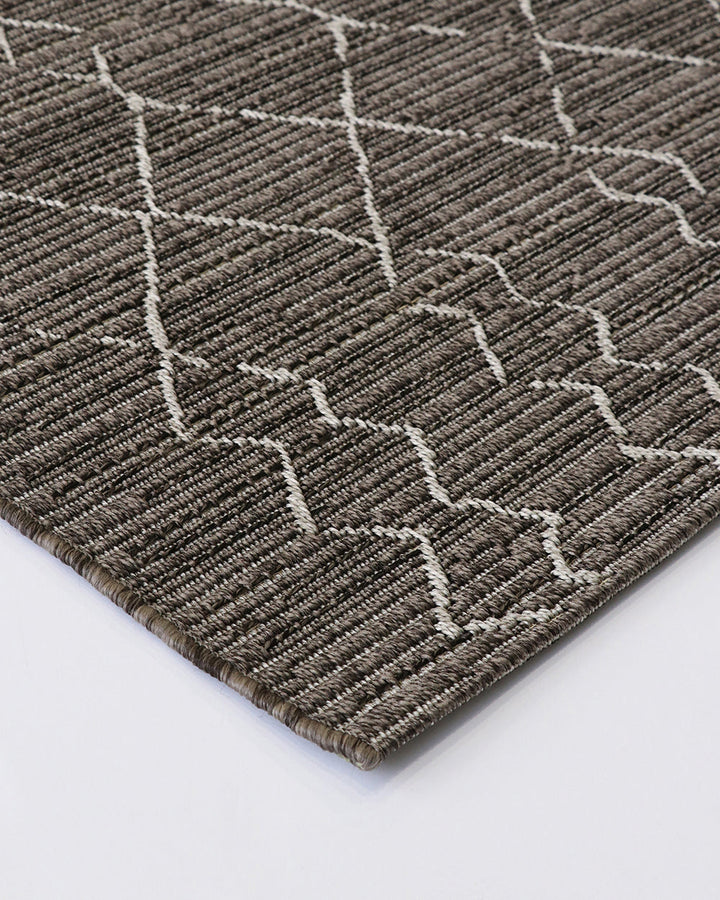 Aruba Floor Rug Featuring a textured weave with irregular linear patterning, the Arubaâ€™s golden earth tones add character and texture to a space. Suitable for use both in and outdoors, the durability and easy care features of the Aruba make it perfect o