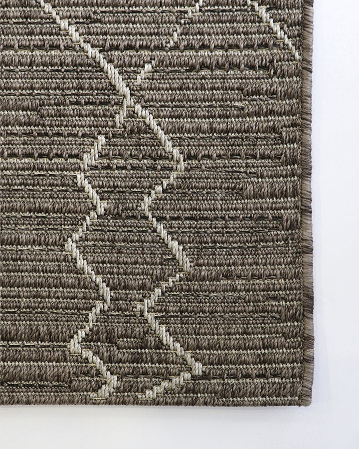 Aruba Floor Rug Featuring a textured weave with irregular linear patterning, the Arubaâ€™s golden earth tones add character and texture to a space. Suitable for use both in and outdoors, the durability and easy care features of the Aruba make it perfect o