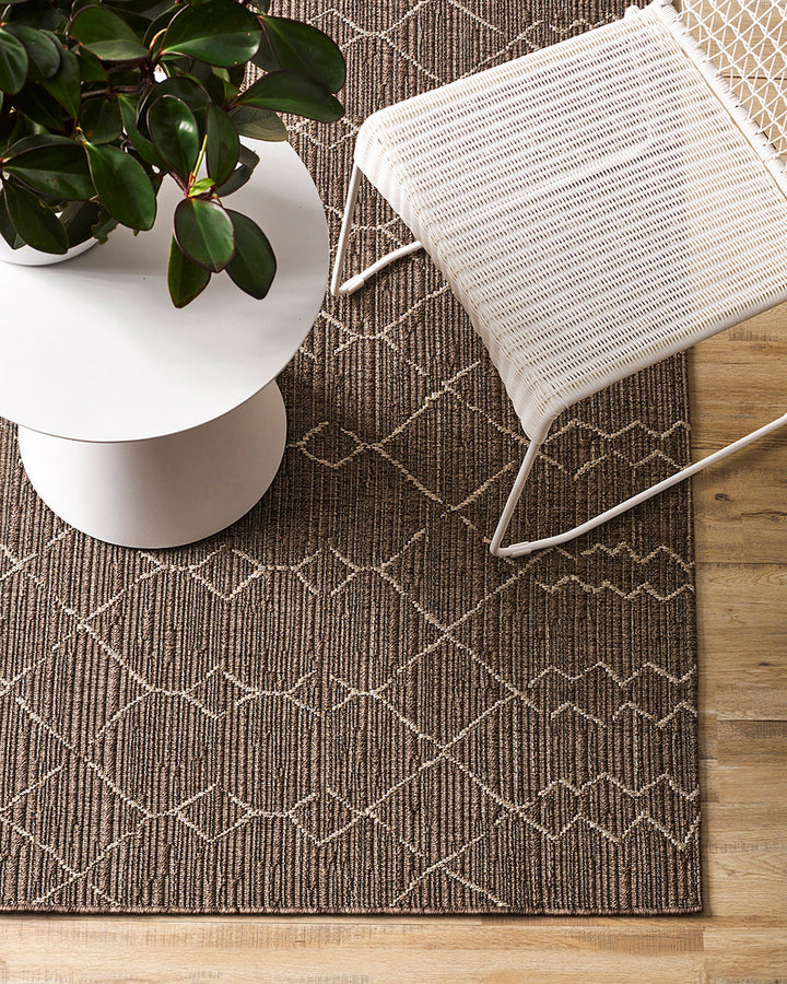 Aruba Floor Rug Featuring a textured weave with irregular linear patterning, the Arubaâ€™s golden earth tones add character and texture to a space. Suitable for use both in and outdoors, the durability and easy care features of the Aruba make it perfect o