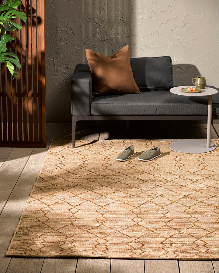 Aruba Floor Rug Featuring a textured weave with irregular linear patterning, the Arubaâ€™s golden earth tones add character and texture to a space. Suitable for use both in and outdoors, the durability and easy care features of the Aruba make it perfect o