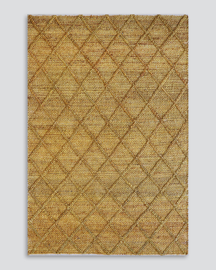 Assam Floor Rug Add earthy style to your home with the relaxed aesthetic of our Assam floor rug. Handwoven from 100% jute, this classic design creates visual interest through raw texture, rich colour, and subtle patterning. This dusky green tone brings a