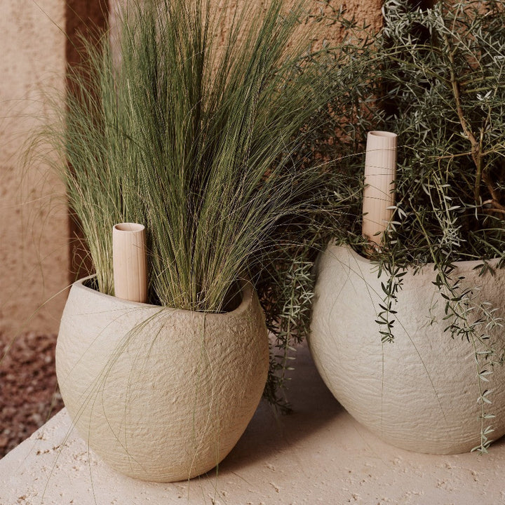 Audo CPH Plantas Planter (Height 24 cm), Ivory by Audo Copenhagen - Product Information: Characterised by their curves and irregular, furrowed surface, the Plantas Planters are made from matte ivory stoneware with a textured, natural appearance. Each piec