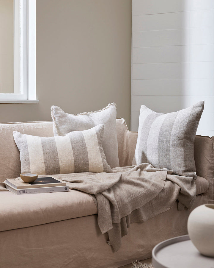 Bannockburn Cushion Create a calming, nurturing space with a modern take on coastal style. Perfect for summer, our Bannockburn cushion brings breezy and timeless style to interiors. Handwoven in a rich, textural linen, this design features a wide linear s