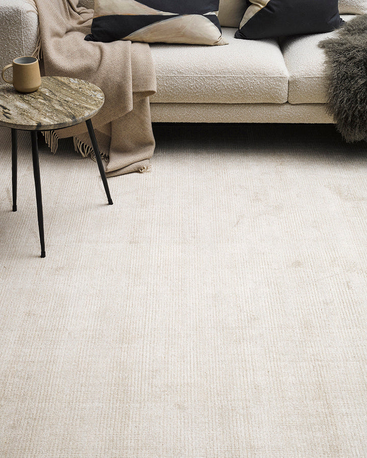 Belverde Floor Rug Embrace everyday luxury with the lustrous sheen and beautifully soft feel of the Belverde. Crafted from a blend of bamboo silk and wool, the low-cut pile and gently mottled slate tone makes this a tranquil addition to any interior. Aust