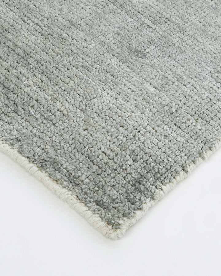 Belverde Floor Rug Embrace everyday luxury with the lustrous sheen and beautifully soft feel of the Belverde. Crafted from a blend of bamboo silk and wool, the low-cut pile and gently mottled slate tone makes this a tranquil addition to any interior. Aust