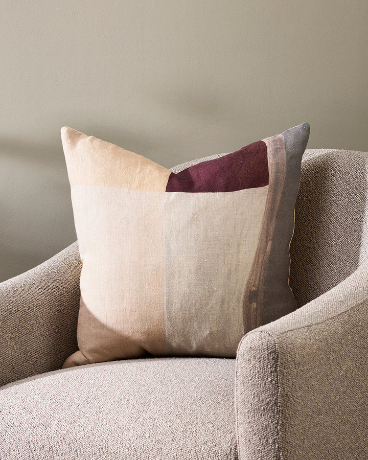 Benny Cushion Designed to inspire and enrich, hand-painted abstract shapes are captured with raw elegance in the design of the Benny. Visible brushstrokes create a crafted ambience, while port red brings a refined, autumnal quality to interiors. Style wit