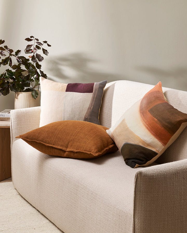 Benny Cushion Designed to inspire and enrich, hand-painted abstract shapes are captured with raw elegance in the design of the Benny. Visible brushstrokes create a crafted ambience, while port red brings a refined, autumnal quality to interiors. Style wit