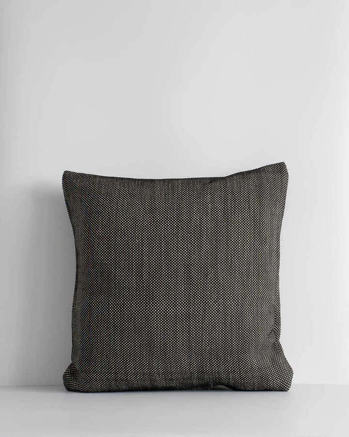 Bina Cushion Set the scene for a stylish, sun-soaked summer with the pared-back design of our Bina cushion. Featuring a textural 1-1 weave, the Binaâ€™s dark colourway is the perfect base upon which to style your outdoor space. Mix and match with other cu