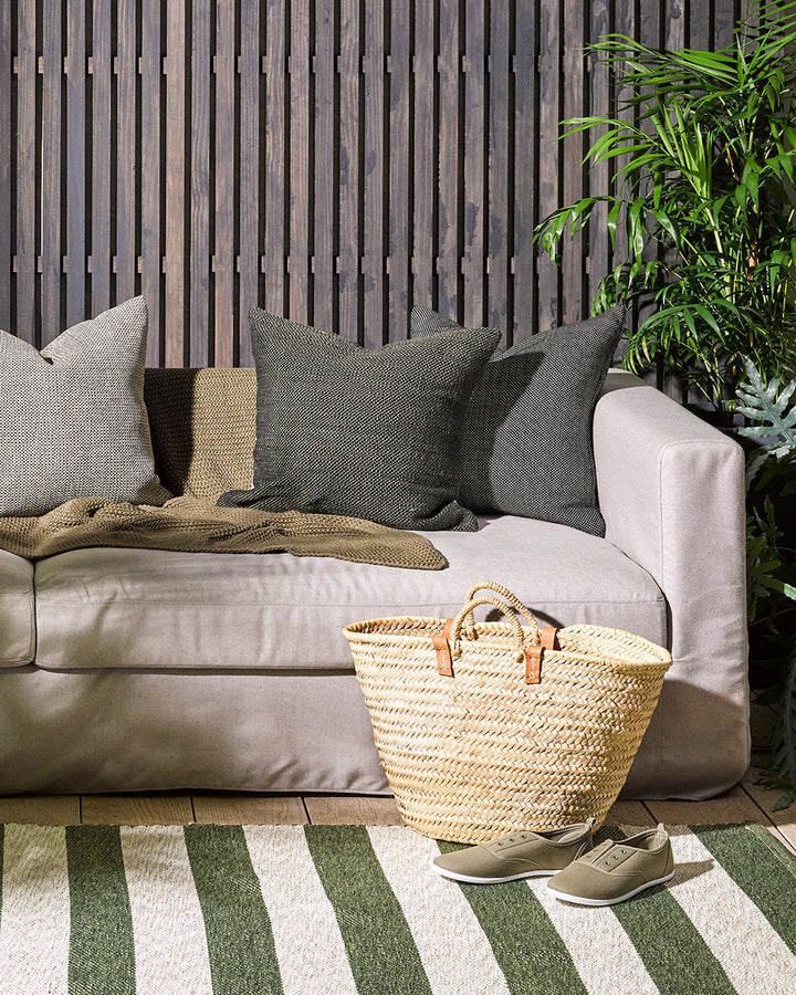 Bina Cushion Set the scene for a stylish, sun-soaked summer with the pared-back design of our Bina cushion. Featuring a textural 1-1 weave, the Binaâ€™s dark colourway is the perfect base upon which to style your outdoor space. Mix and match with other cu