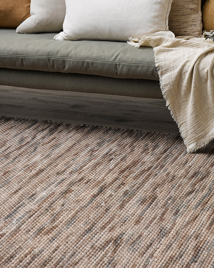 Boardwalk Floor Rug Immerse yourself in theÂ moodyÂ green tones of our Boardwalk floor rug. Space-dyed fibres of wool and cotton form a mottled pattern reminiscent of forest foliage. Rustic, with a refined feel, the Boardwalk invites us to create nurturin