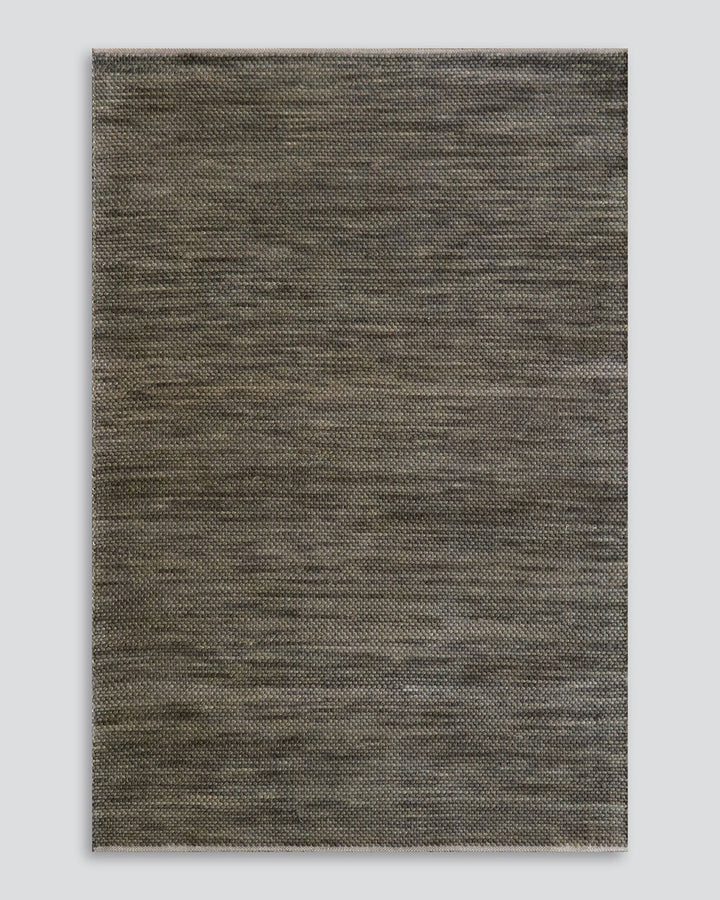 Boardwalk Floor Rug Immerse yourself in theÂ moodyÂ green tones of our Boardwalk floor rug. Space-dyed fibres of wool and cotton form a mottled pattern reminiscent of forest foliage. Rustic, with a refined feel, the Boardwalk invites us to create nurturin