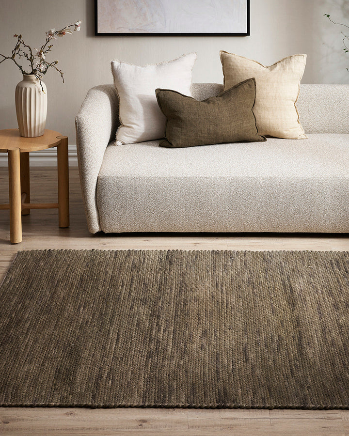 Boardwalk Floor Rug Immerse yourself in theÂ moodyÂ green tones of our Boardwalk floor rug. Space-dyed fibres of wool and cotton form a mottled pattern reminiscent of forest foliage. Rustic, with a refined feel, the Boardwalk invites us to create nurturin