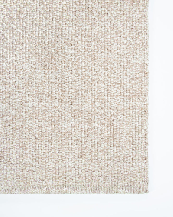 Burleigh Floor Rug Create a relaxed exterior setting with understated texture and soft charcoal tones. With the look and feel of an indoor rug, the Burleigh’s sustainable composition makes this an eco-friendly choice for refined exterior space. This piece