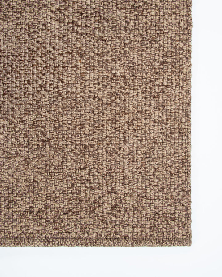 Burleigh Floor Rug Create a relaxed exterior setting with understated texture and soft charcoal tones. With the look and feel of an indoor rug, the Burleigh’s sustainable composition makes this an eco-friendly choice for refined exterior space. This piece