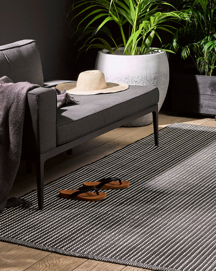 Byron Bay Floor Rug Create an easy flow between indoor and outdoor spaces with the pared-back design of our Byron Bay outdoor rug. Contemporary and stylish, this versatile piece is suitable for use both in and outdoors. Fully reversible and easy to care f