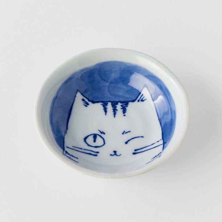 10cm bowl featuring a cute winking cat design in blue and white ceramic, perfect for serving snacks or as decor.