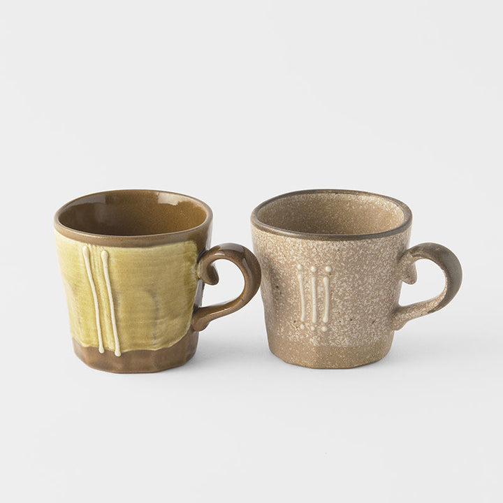 Mug set featuring two 300ml mugs in earthy tones, showcasing unique glaze designs and textures.