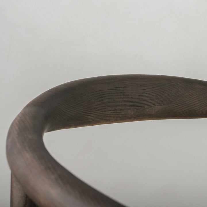 Essence Dining Chair Paper Rope/Smoke curved Ash wood detail showcasing natural craftsmanship and ergonomic design.