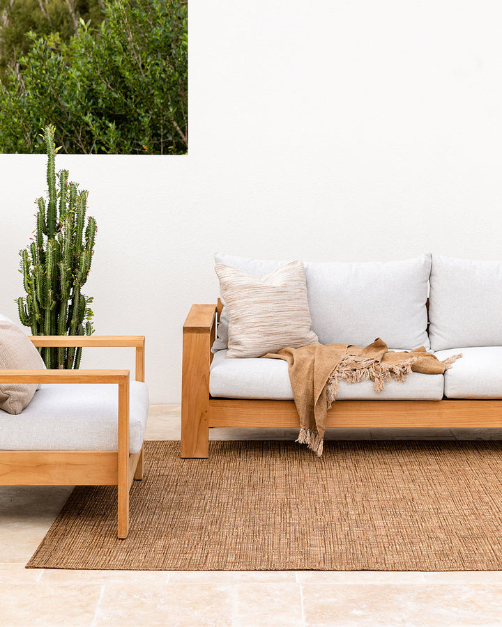 Chandler Cushion Create an outdoor sanctuary with the pared-back design of our Chandler cushion. Handwoven in a textural two-tone yarn, the simple design and soft colourway make the perfect combination for easy summer living. This piece works just as well