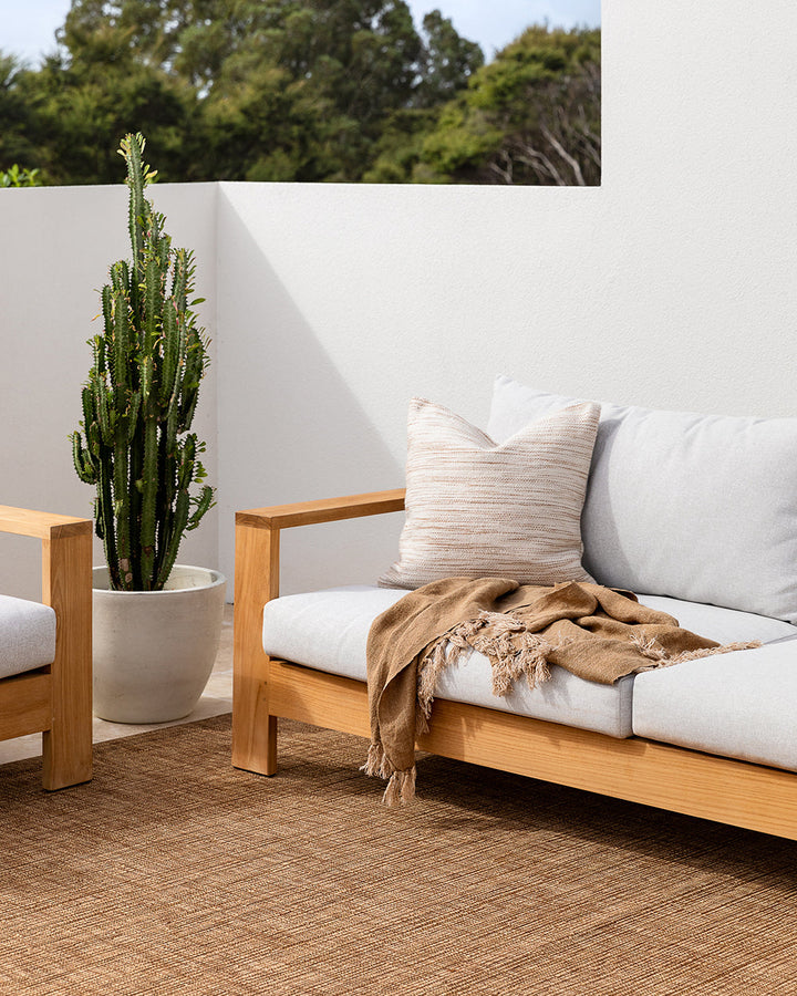 Chandler Cushion Create an outdoor sanctuary with the pared-back design of our Chandler cushion. Handwoven in a textural two-tone yarn, the simple design and soft colourway make the perfect combination for easy summer living. This piece works just as well