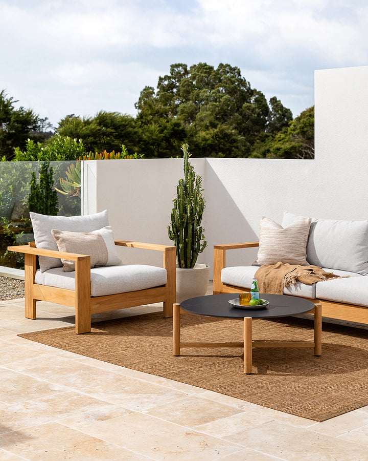 Chandler Cushion Create an outdoor sanctuary with the pared-back design of our Chandler cushion. Handwoven in a textural two-tone yarn, the simple design and soft colourway make the perfect combination for easy summer living. This piece works just as well