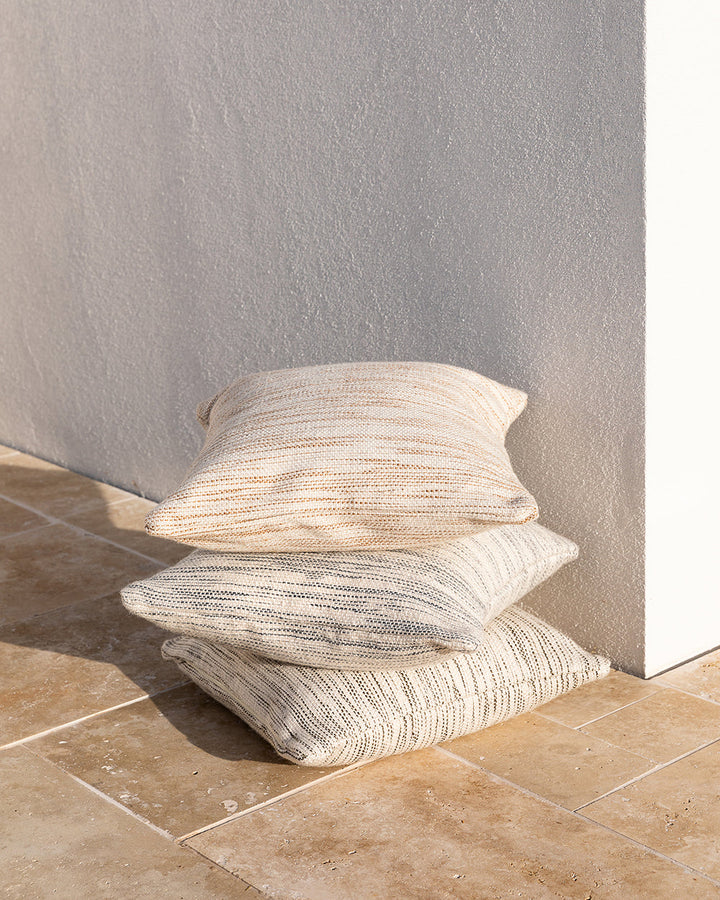 Chandler Cushion Create an outdoor sanctuary with the pared-back design of our Chandler cushion. Handwoven in a textural two-tone yarn, the simple design and soft colourway make the perfect combination for easy summer living. This piece works just as well