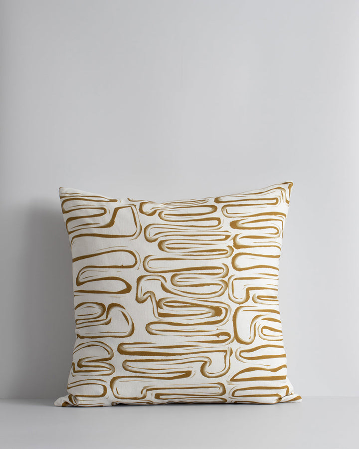 Chemin Cushion Primal and abstract, the Chemin makes a subtle, on-trend statement with organic hand-painted patterns. Warm tones of brass and ivory bring a sense of calm and serenity to spaces. Pair with sister cushion Anise and core cushions Cassia Tobac