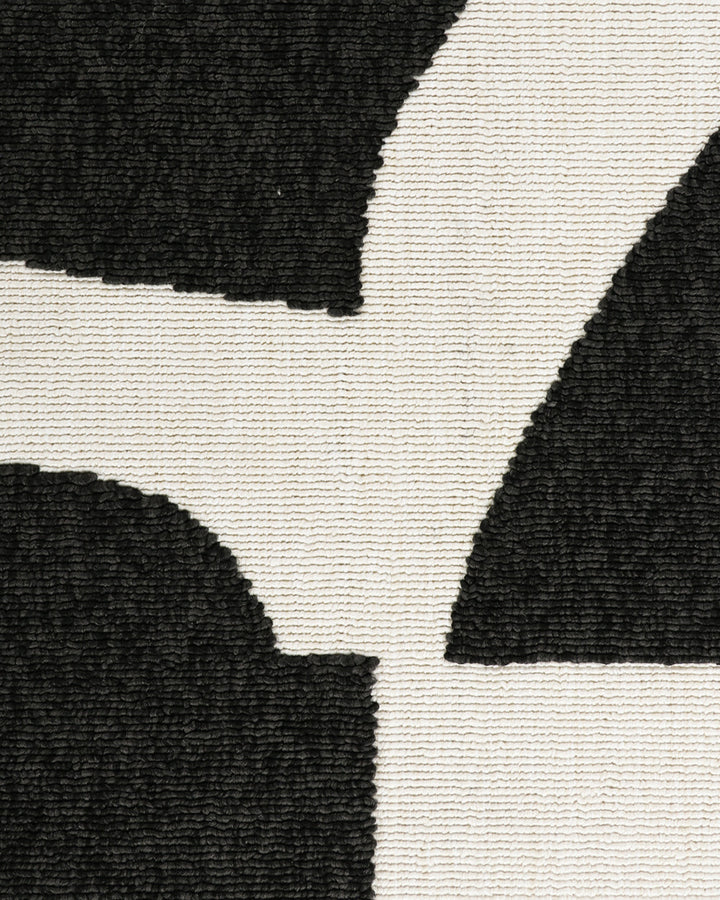 Copacabana Floor Rug Make a lasting impression with the stylish design of the Copacabana rug. Woven in a timeless ivory colourway, the dense tufting creates a lush underfoot feel, while the raised design adds a sculptural element to your space. Versatile