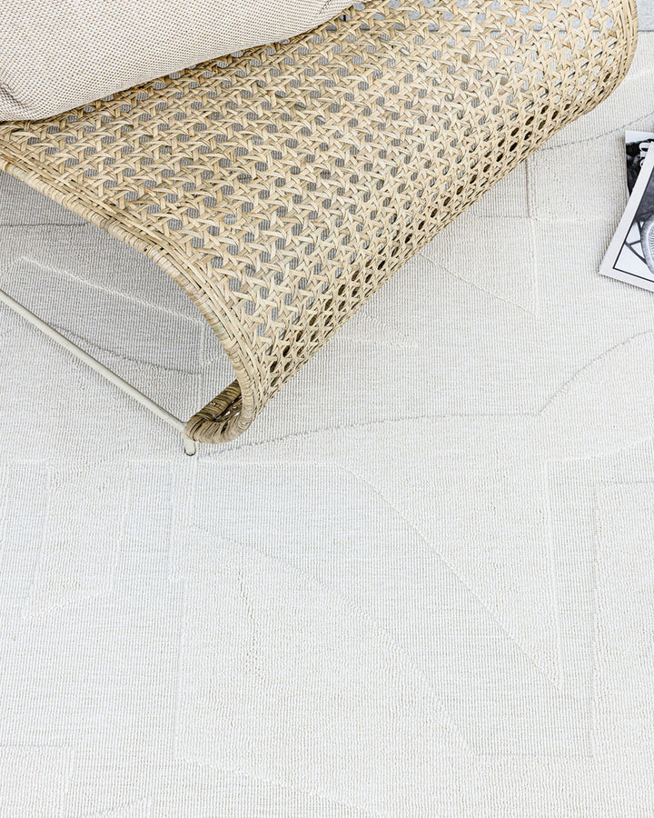 Copacabana Floor Rug Make a lasting impression with the stylish design of the Copacabana rug. Woven in a timeless ivory colourway, the dense tufting creates a lush underfoot feel, while the raised design adds a sculptural element to your space. Versatile