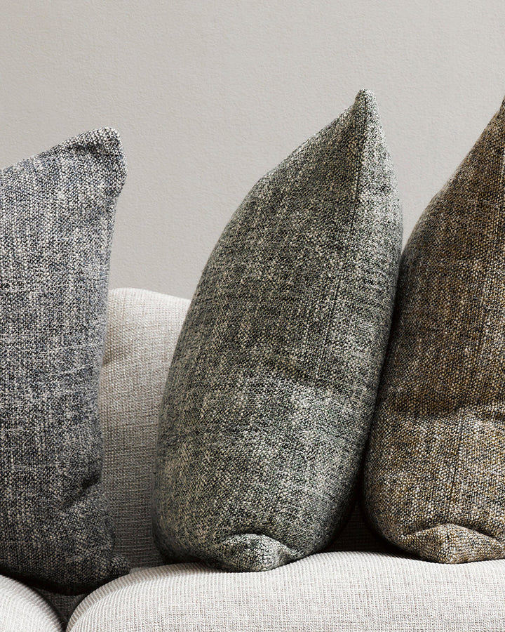 Cumbria Cushion Earthy colourways of marled yarn create the subtle tone of our Cumbria cushion. Handwoven in shades of dijon and ecru, the texture and soft mottled effect makes this a timeless piece for a grounded and restorative interior. Use as a pairin